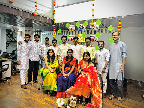ImmensoTech software development team celebrating Dussehra festival in traditional attire at the office